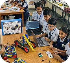 Robotics Premier League — students with kits