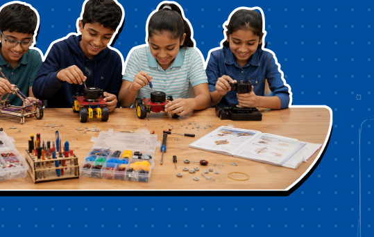 Students building kits at a classroom table